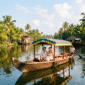 Best time to visit Alleppey backwaters with a traditional shikara boat cruising through Kerala canals