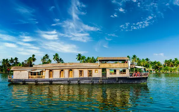 Traditional houseboat on an Alleppey backwaters day trip in Kerala