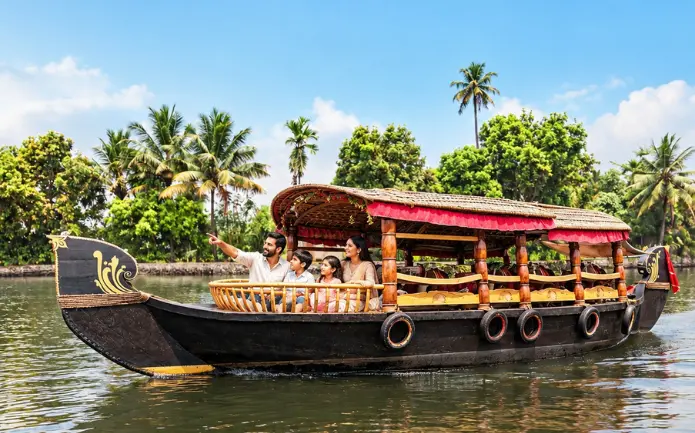 Private Shikara boat Alleppey cruising through Kerala backwaters with family